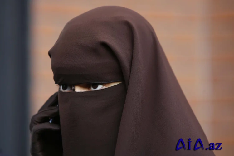 Daha bir ölkədə niqab taxmağa qadağa qoyulub