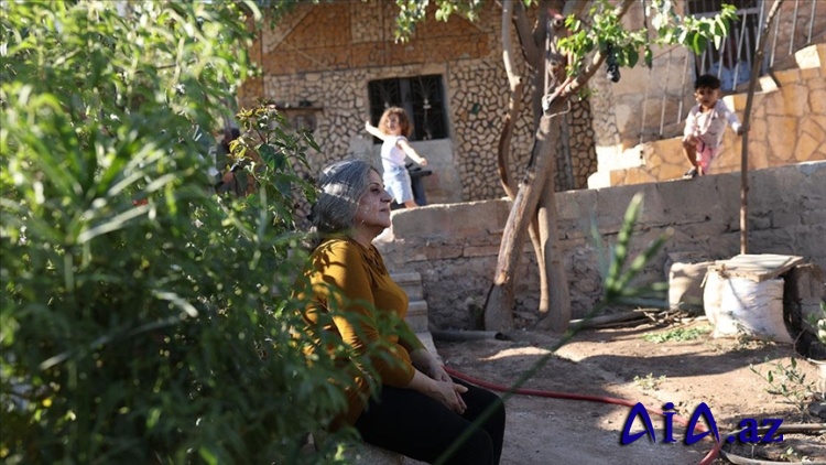 Afrinli ailələr illər sonra evlərinə qayıtmaqdan xoşbəxtdirlər